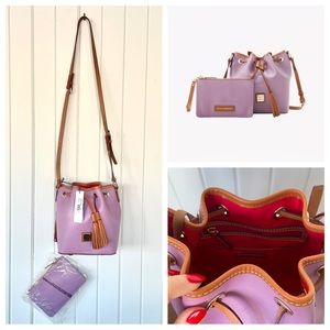 Dooney & Bourke NWT bucket crossbody bag.Lavender/light mauve colorway